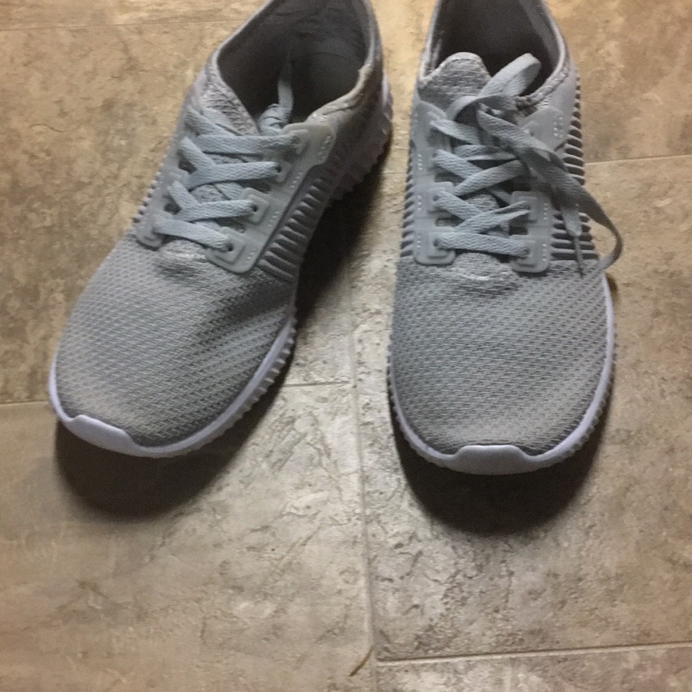 Grey and white running shoe sz12